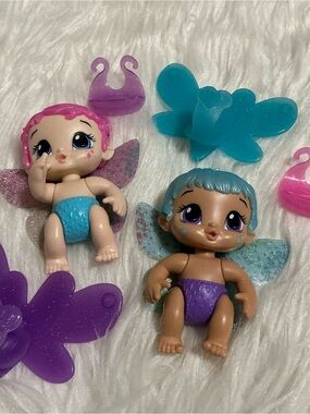 Two Baby Alive Glo Pixies Minis plus accessories
